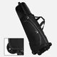 Black golf travel bag with wheels on a white background