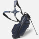 Navy blue golf bag with stand on a white background