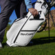 White golf bag with 'RevCore' branding on a golf course