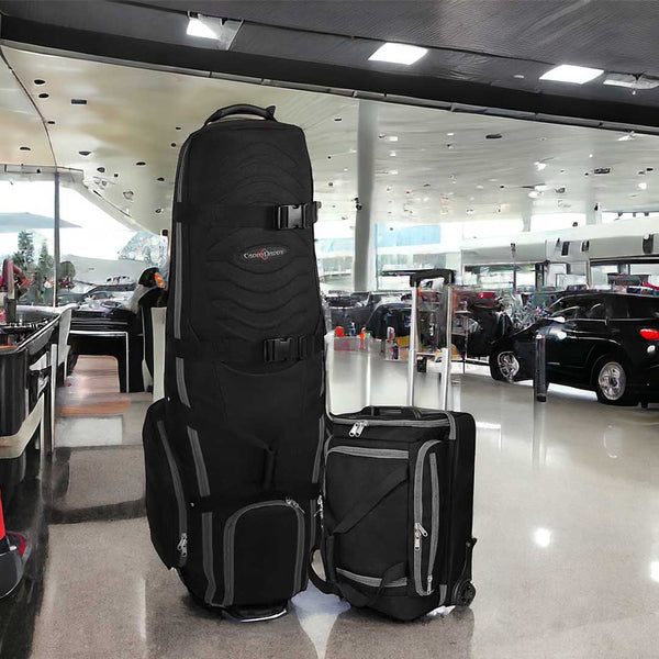 Black travel bags on display in a car showroom.