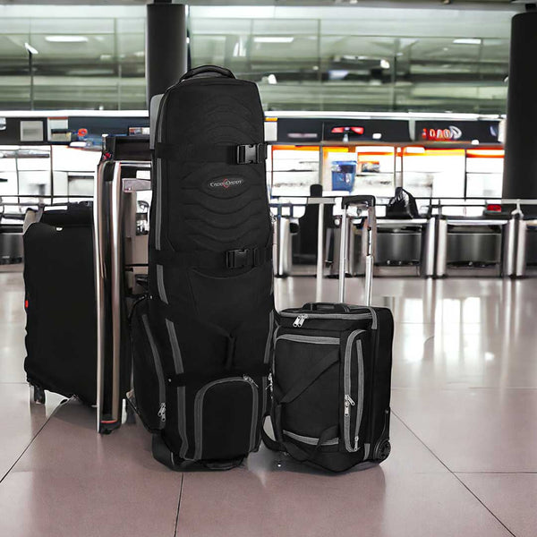 Black and gray suitcases with a visible brand logo in an airport setting